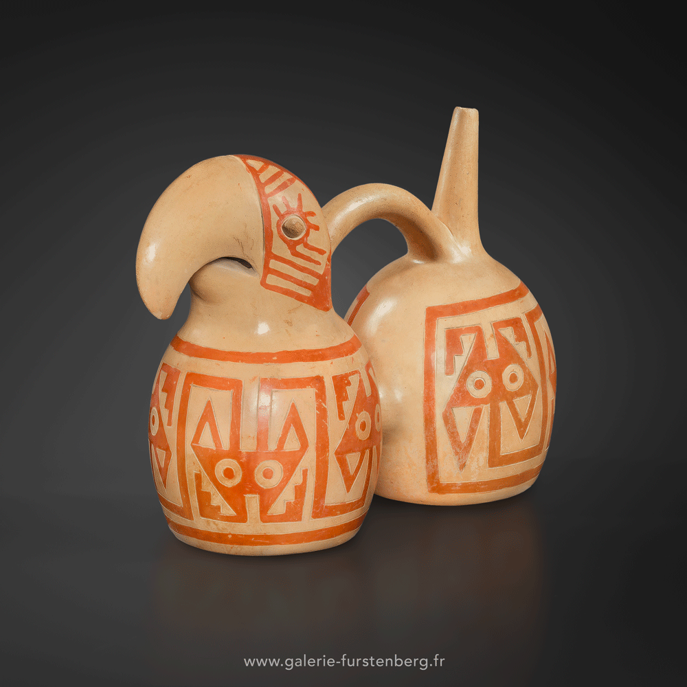 Double spout vessel of a Toucan